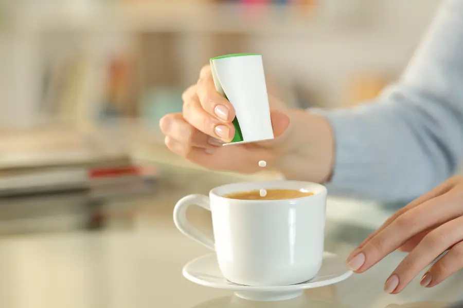 Consuming large amounts of artificial sweeteners